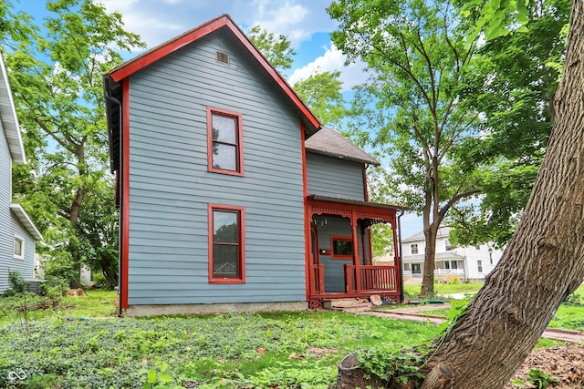 115 Simpson St, Crawfordsville, IN 47933 - rear view of house with covered porch