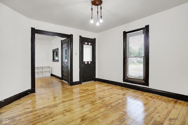 115 Simpson St, Crawfordsville, IN 47933 - empty room featuring plenty of natural light and light wood-type flooring