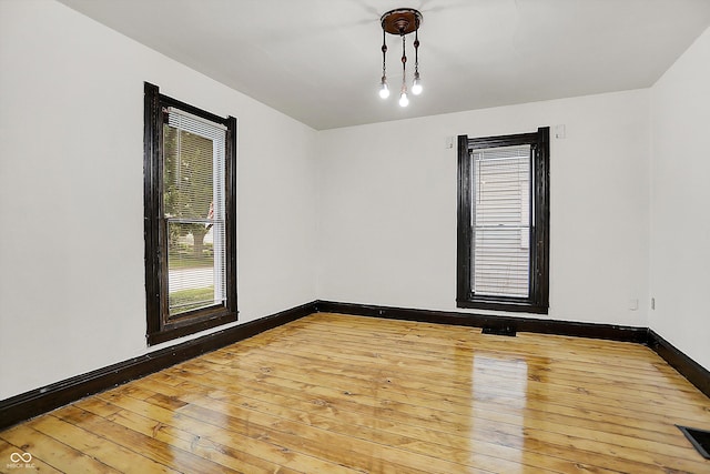 115 Simpson St, Crawfordsville, IN 47933 - unfurnished room featuring hardwood / wood-style flooring