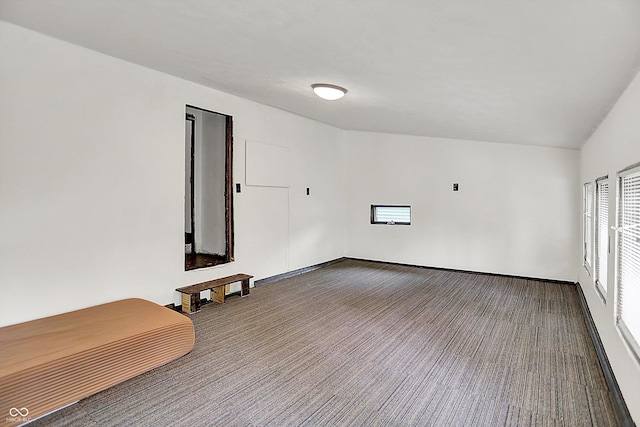 115 Simpson St, Crawfordsville, IN 47933 - spare room with dark carpet and baseboards