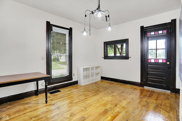 115 Simpson St, Crawfordsville, IN 47933 - entryway featuring baseboards and wood-type flooring