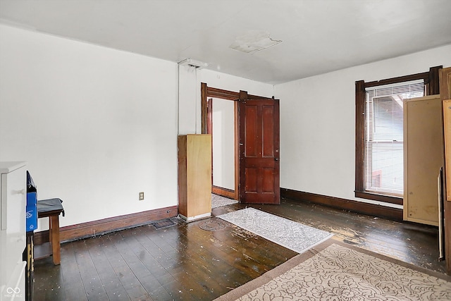 115 Simpson St, Crawfordsville, IN 47933 - spare room featuring hardwood / wood-style floors