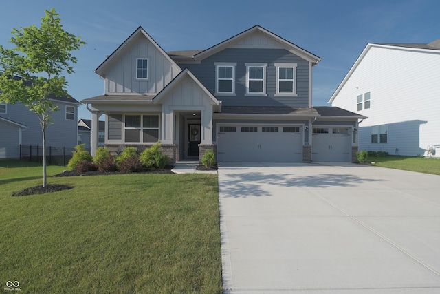 11663 Winnower, Noblesville, IN 46060 - craftsman house with board and batten siding, driveway, an attached garage, and brick siding