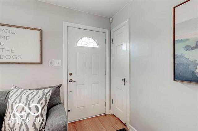 5363 Primrose Ave, Indianapolis, IN 46220 - foyer with light wood-style floors