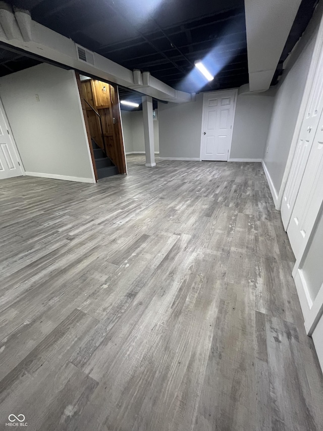 5363 Primrose Ave, Indianapolis, IN 46220 - finished basement with wood finished floors and stairway