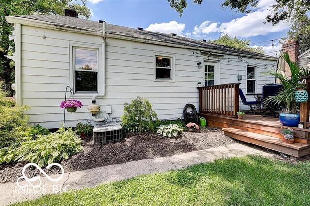 5363 Primrose Ave, Indianapolis, IN 46220 - rear view of property with a deck and a chimney