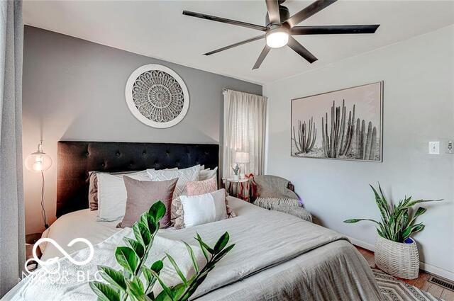 5363 Primrose Ave, Indianapolis, IN 46220 - bedroom featuring ceiling fan and wood finished floors