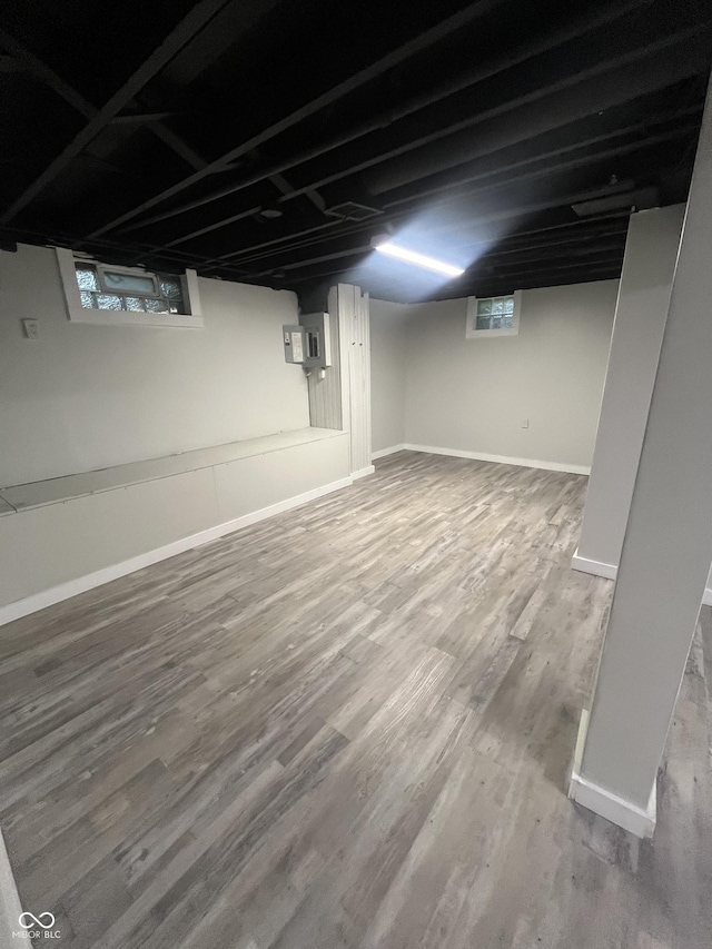 5363 Primrose Ave, Indianapolis, IN 46220 - basement featuring wood finished floors and healthy amount of natural light