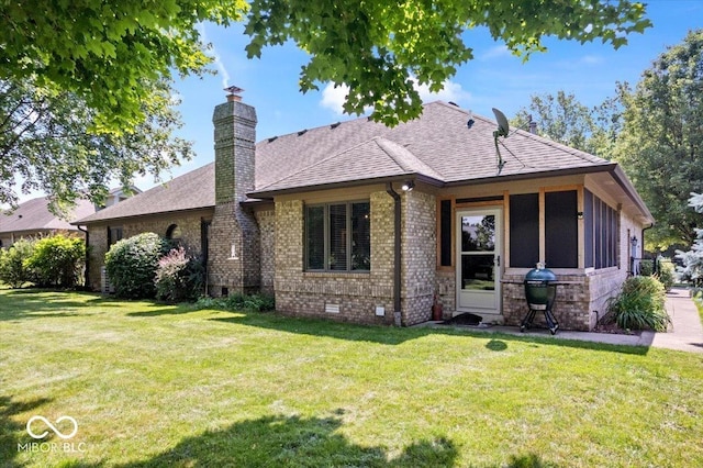 770 Viewpoint Dr, Plainfield, IN 46168 - rear view of house with crawl space, brick siding, a chimney, and a yard