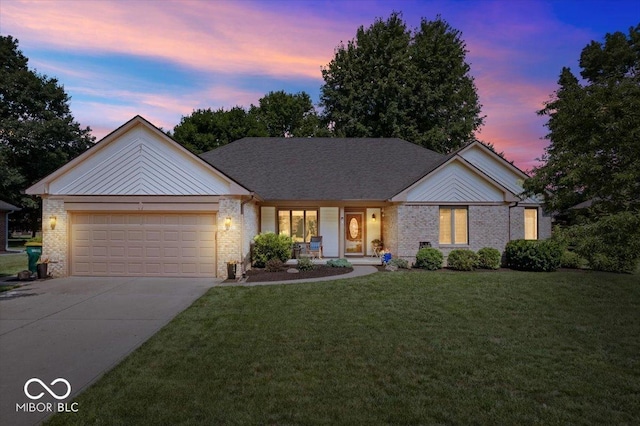 770 Viewpoint Dr, Plainfield, IN 46168 - single story home featuring brick siding, concrete driveway, an attached garage, and a yard