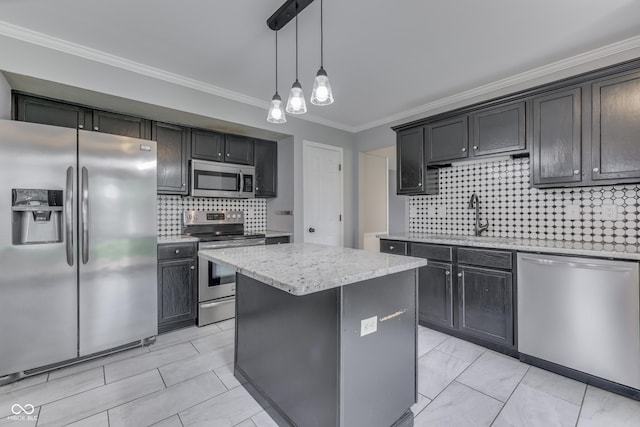 7914 Willow Wind Cir, Indianapolis, IN 46239 - kitchen with appliances with stainless steel finishes, crown molding, tasteful backsplash, a center island, and light stone counters