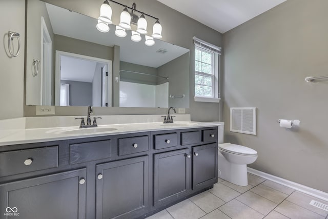 7914 Willow Wind Cir, Indianapolis, IN 46239 - bathroom with double vanity, a shower, and tile patterned flooring