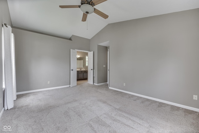 7914 Willow Wind Cir, Indianapolis, IN 46239 - unfurnished bedroom featuring lofted ceiling, light carpet, ensuite bath, and a ceiling fan