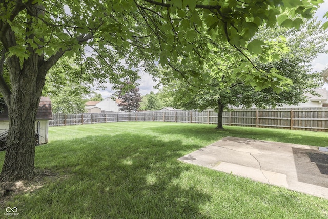 7914 Willow Wind Cir, Indianapolis, IN 46239 - fenced backyard featuring a patio