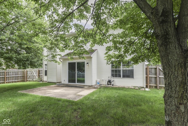 7914 Willow Wind Cir, Indianapolis, IN 46239 - rear view of property with a patio area and a fenced backyard