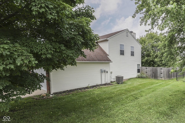 7914 Willow Wind Cir, Indianapolis, IN 46239 - view of property exterior featuring a chimney and a shingled roof