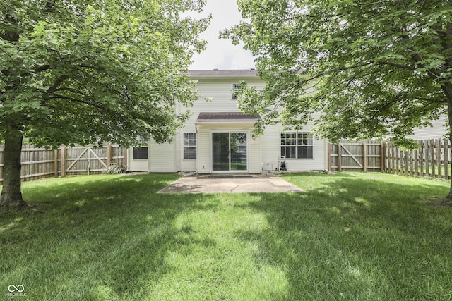 7914 Willow Wind Cir, Indianapolis, IN 46239 - back of house with a patio area and a fenced backyard