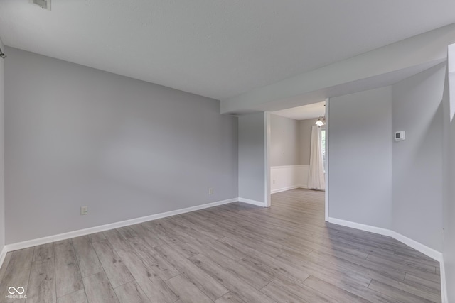 7914 Willow Wind Cir, Indianapolis, IN 46239 - empty room with wood finished floors and baseboards