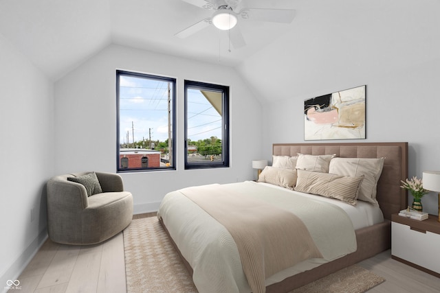 1100 English Ave, Indianapolis, IN 46203 - bedroom featuring lofted ceiling, light wood-type flooring, and a ceiling fan