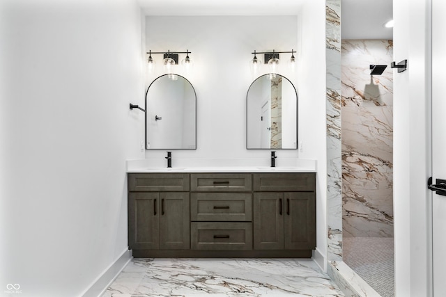 1100 English Ave, Indianapolis, IN 46203 - bathroom with marble tiled floors, double vanity, a marble finish shower, and recessed lighting