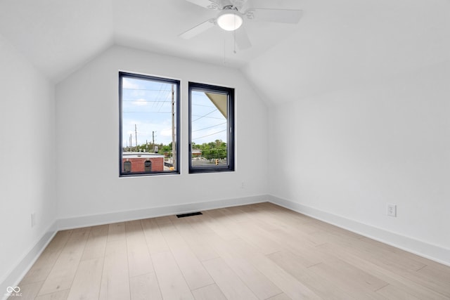 1100 English Ave, Indianapolis, IN 46203 - bonus room with lofted ceiling, light wood finished floors, and ceiling fan