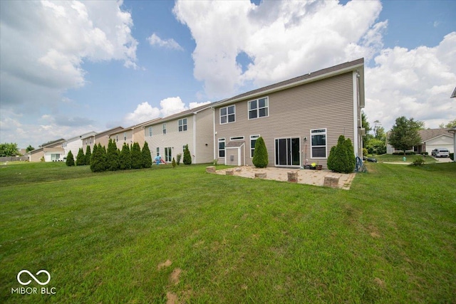 5859 Edelle Dr, Indianapolis, IN 46237 - back of property featuring a patio and a lawn