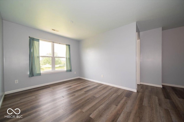 5859 Edelle Dr, Indianapolis, IN 46237 - spare room with dark wood-style floors