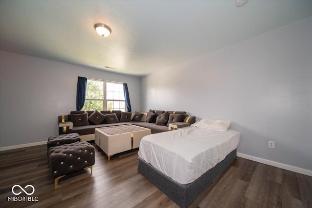 5859 Edelle Dr, Indianapolis, IN 46237 - living area featuring dark wood-style floors and baseboards