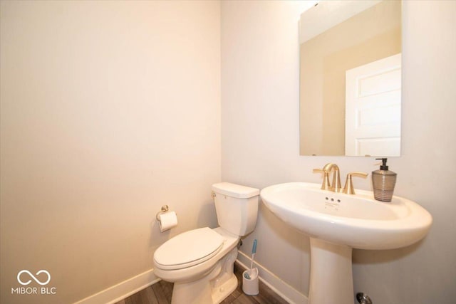 3609 Merchmont Rd, Bargersville, IN 46106 - bathroom with baseboards and wood finished floors