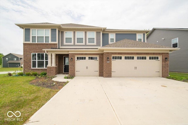 3609 Merchmont Rd, Bargersville, IN 46106 - view of front of home with brick siding, concrete driveway, a front yard, and a garage