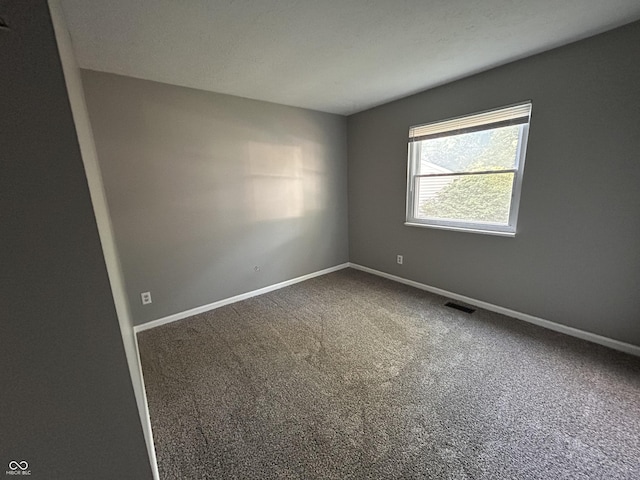 3525 Valley Lake Dr, Indianapolis, IN 46227 - carpeted empty room with baseboards