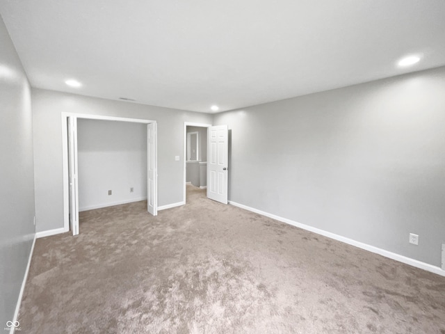 770 Tulip Ln, Greenwood, IN 46143 - below grade area with carpet floors and recessed lighting
