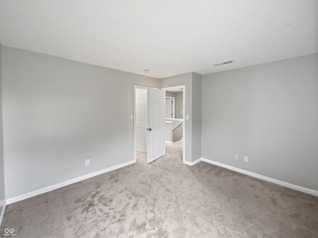 770 Tulip Ln, Greenwood, IN 46143 - spare room with carpet and baseboards