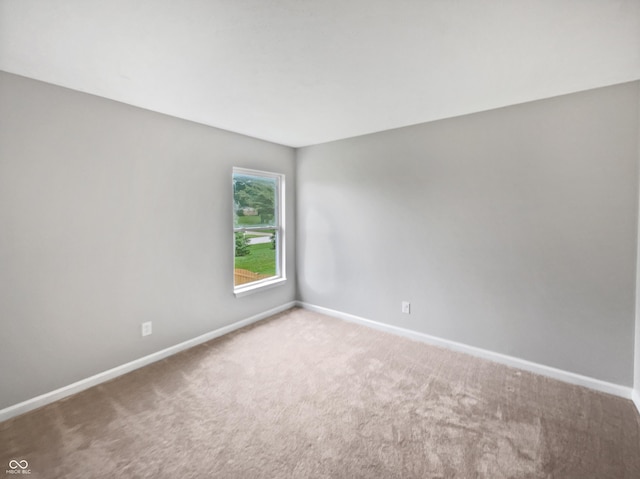 770 Tulip Ln, Greenwood, IN 46143 - spare room with carpet floors and baseboards