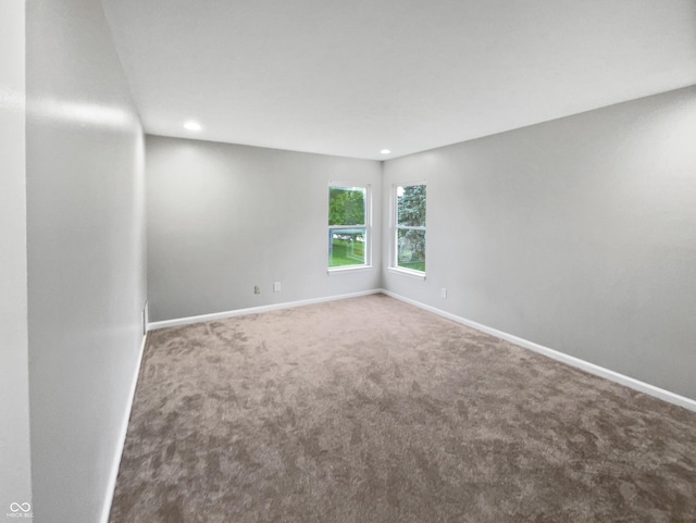 770 Tulip Ln, Greenwood, IN 46143 - spare room with recessed lighting and carpet
