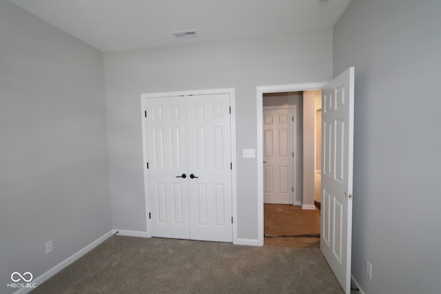 10602 Maidenhair Dr, Indianapolis, IN 46239 - unfurnished bedroom featuring carpet and a closet