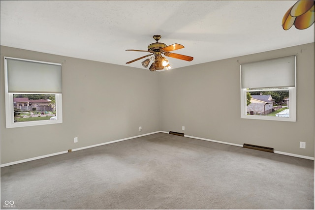 3322 N Riley Ave N, Indianapolis, IN 46218 - carpeted spare room with ceiling fan and baseboards