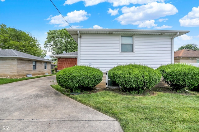 3322 N Riley Ave N, Indianapolis, IN 46218 - view of home's exterior with a yard