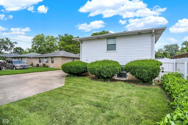 3322 N Riley Ave N, Indianapolis, IN 46218 - view of side of home featuring a central air condition unit