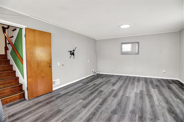 3322 N Riley Ave N, Indianapolis, IN 46218 - spare room with wood finished floors and stairs