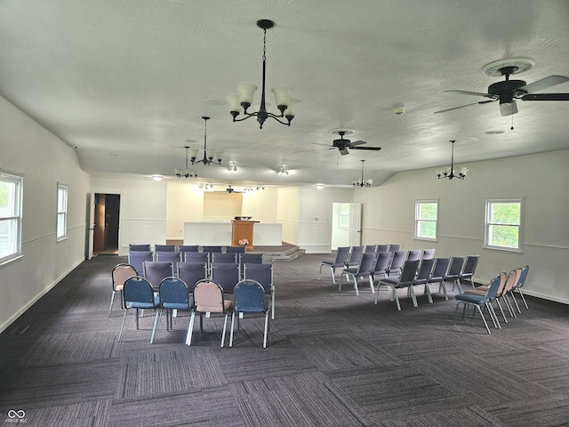 1267 W 750 S, Trafalgar, IN 46181 - misc room featuring dark carpet, a chandelier, a ceiling fan, a textured ceiling, and vaulted ceiling