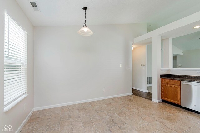 12121 Driftstone Dr, Fishers, IN 46037 - unfurnished dining area featuring healthy amount of natural light and stone finish flooring