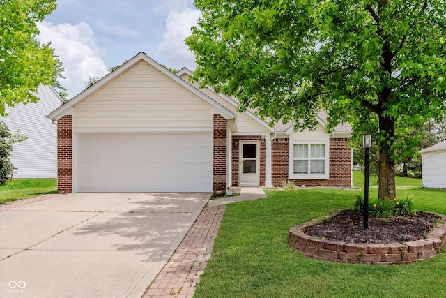 12121 Driftstone Dr, Fishers, IN 46037 - view of front of home with brick siding, driveway, a front lawn, and a garage
