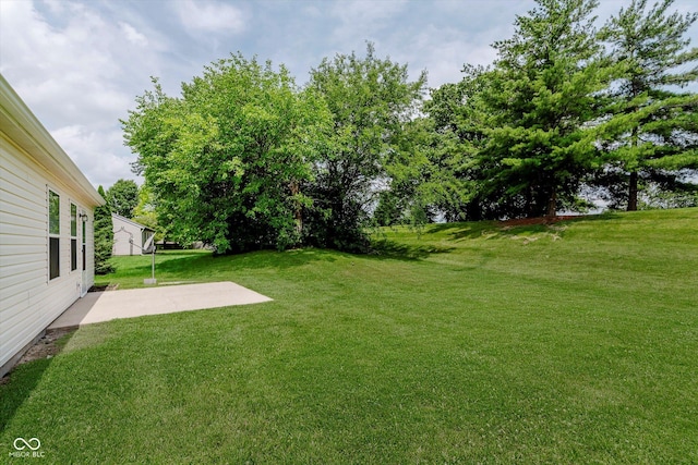 12121 Driftstone Dr, Fishers, IN 46037 - view of green lawn featuring a patio area
