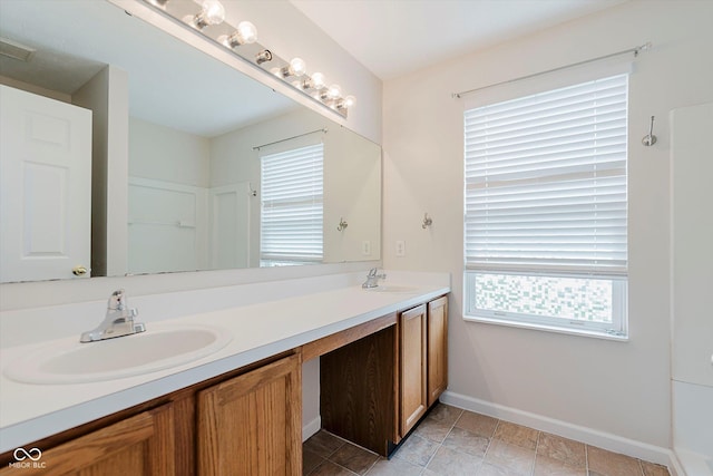 12121 Driftstone Dr, Fishers, IN 46037 - full bathroom with double vanity and healthy amount of natural light