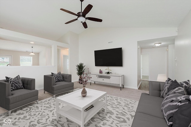 12121 Driftstone Dr, Fishers, IN 46037 - living room with a ceiling fan, light colored carpet, and high vaulted ceiling