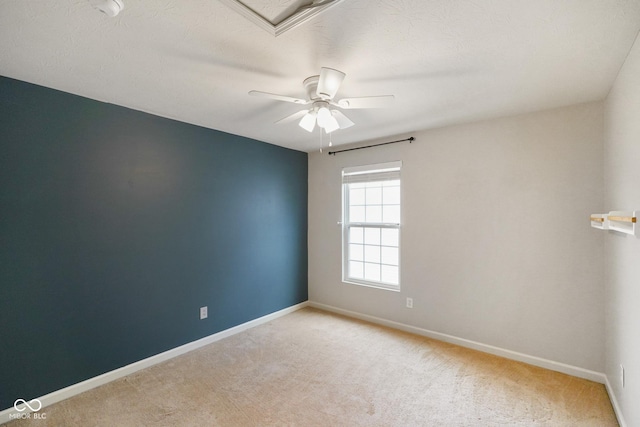 6670 Shooting Star Dr, Whitestown, IN 46075 - spare room featuring light carpet, a ceiling fan, and a smoke detector