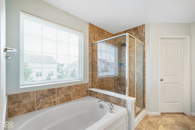 6670 Shooting Star Dr, Whitestown, IN 46075 - bathroom featuring a bath and a stall shower