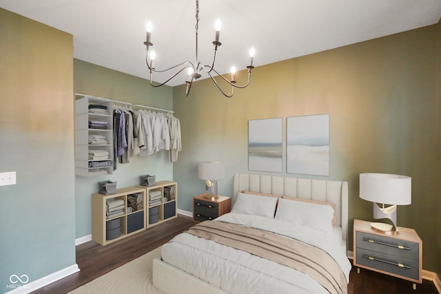 6670 Shooting Star Dr, Whitestown, IN 46075 - bedroom with a chandelier and wood finished floors