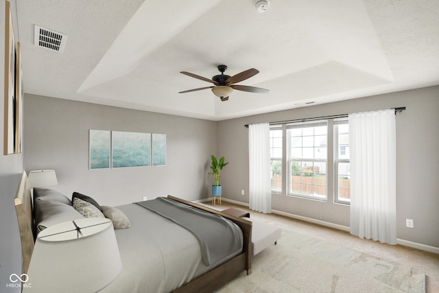 6670 Shooting Star Dr, Whitestown, IN 46075 - carpeted bedroom featuring a raised ceiling and ceiling fan